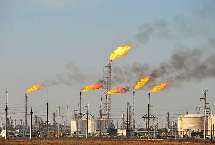 Natural gas flares pollute the environment day and night