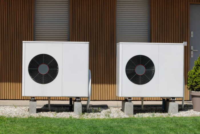 Air source heat pump units installed in front of the house